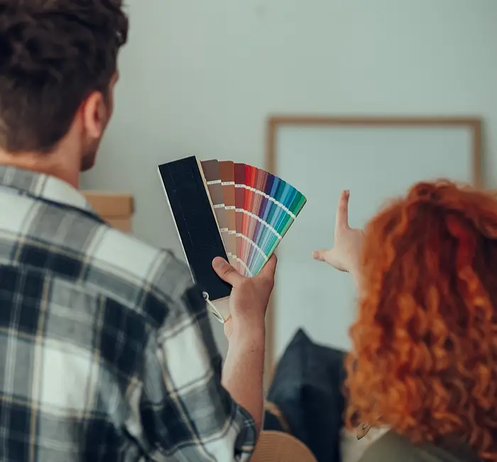 Homeowners selecting building materials and finishes for a luxury residence.