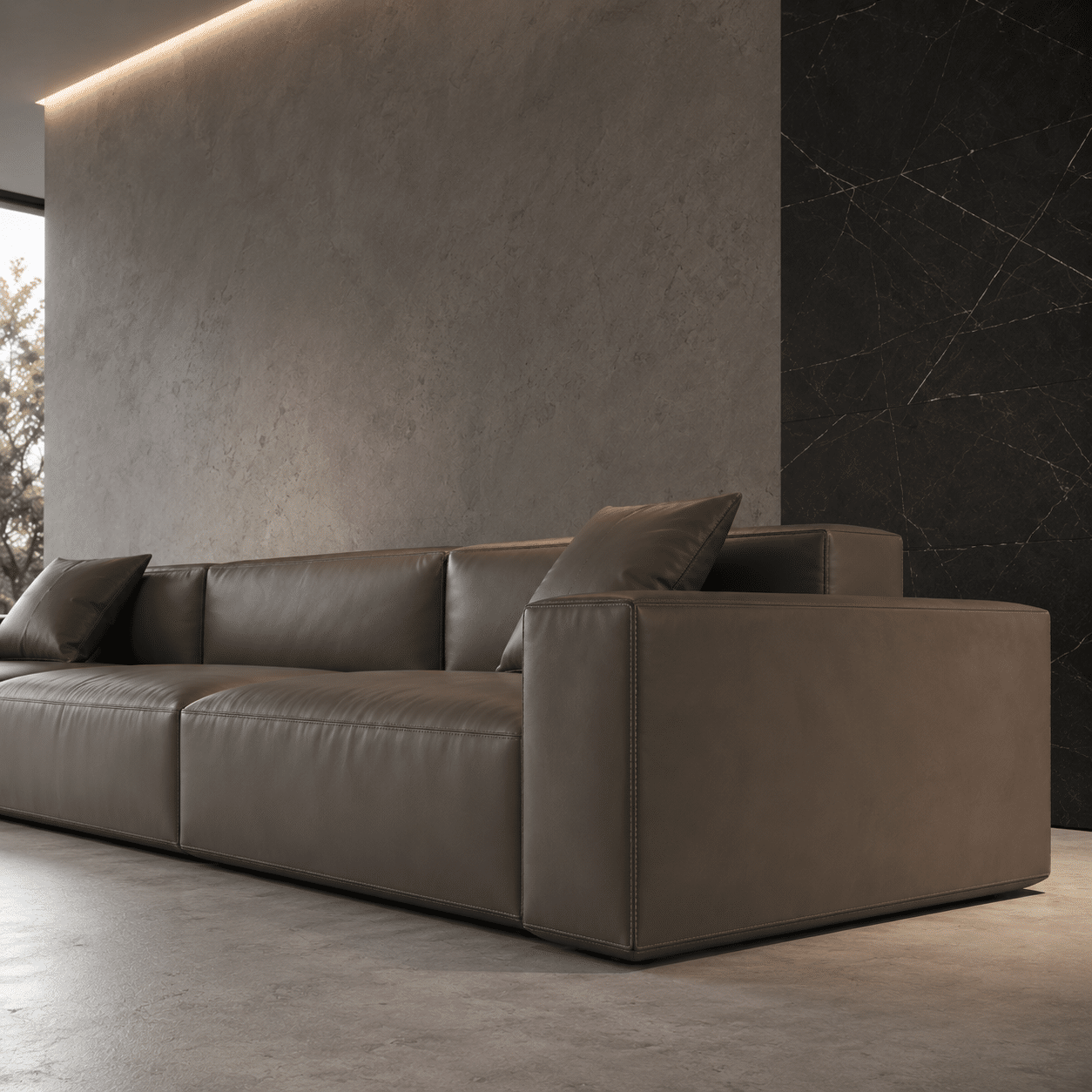 Low-profile linear leather couch representing premium bespoke modular sofa systems engineering.