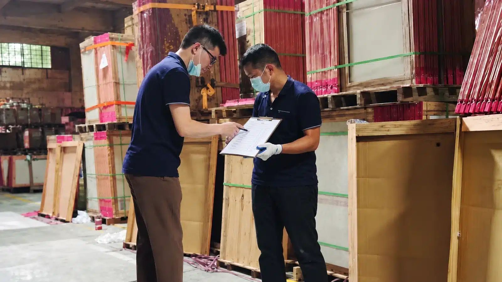 Supplier production capacity review with factory team equipment and packed building materials
